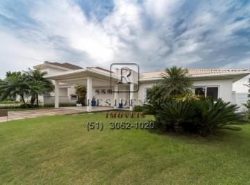 Foto 01 · Espetacular casa em condomínio com 3 quartos e 4 vagas de garagem em Belém Novo, Porto Alegre-RS!