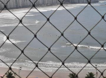 Apartamento de 4 quartos, Guarujá · Espaçoso apartamento com vista para o mar e uma bela churrasqueira na varanda
