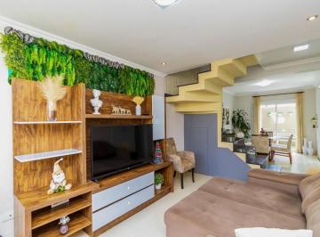 Foto 1 · 
                    Sobrado à venda, 103 m² por R$ 650.000,01 - Uberaba - Curitiba/PR
             