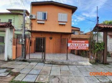8c2f1194e4d159604d09dea6f41a1cfeb8f0a6eb · Casa com 3 dormitórios para alugar, 60 m² por R$ 1.440,00/mês - Vila Nova - Porto Alegre/RS