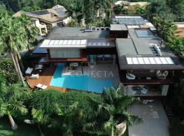 Foto 1 · Casa para Venda e Locação com 4 Quartos no Tamboré 01