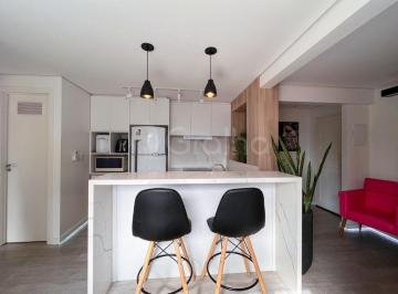 001 · Apartamento de 61m² com 2 quartos sendo 1 suíte no Centro