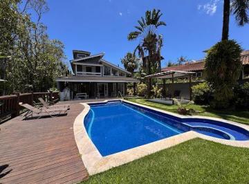 ed962670e2a62b0cadab52e5c5bf3bbe6e467b13 · Casa em Condomínio na Praia da Baleia | 4 Dormitórios, Piscina Privativa e Varanda Gourmet
