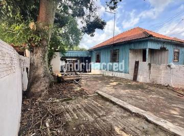 011765804163067.jpg · Terreno de 539m² com 2 Casas de Madeira em Excelente Localização, Ideal para Investimento ou Constru