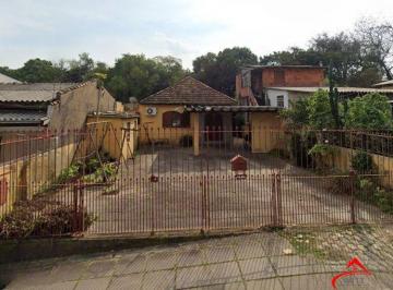 Casa · 70m² · 3 Quartos · 4 Vagas · Excelente imóvel com terreno amplo à venda no Jardim Itu – Porto Alegre