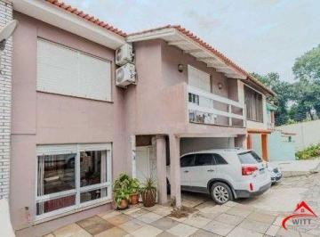 Casa · 240m² · 4 Quartos · 2 Vagas · Casa em condomínio no bairro Santo Antônio de 4 dormitórios e 2 vagas