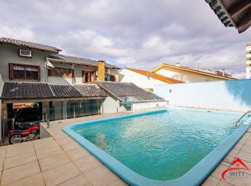 Casa · 208m² · 4 Quartos · 3 Vagas · Casa de 4 dormitórios e 208m² à venda no Bairro Jardim Botânico, Porto Alegre.