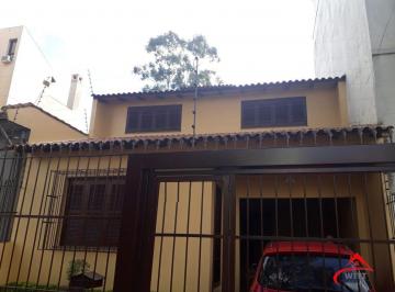 Casa · 200m² · 3 Quartos · 3 Vagas · Casa sobrado no bairro Auxiliadora de 3 dormitórios e 3 vagas