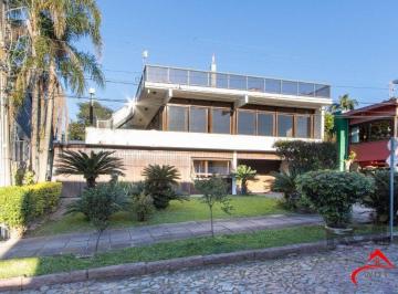 Casa · 375m² · 3 Quartos · 4 Vagas · Casa em condomínio que possui  3 dormitórios, sendo 1suíte, lavabo, escritório,