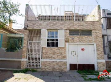 casa-fachada · CASA A VENDA NA OLAVO BILAC, 3 DORMITÓRIOS.