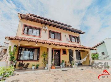 Casa · 234m² · 3 Quartos · 3 Vagas · Casa com 234m², 3 dormitórios, 3 vagas no bairro Partenon