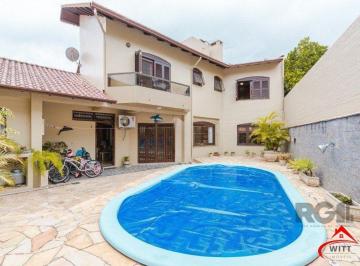 Casa · 295m² · 4 Quartos · 2 Vagas · Casa com 4 dormitórios no bairro Morro Santana