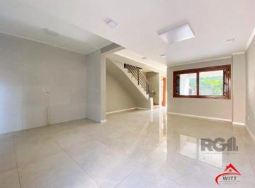 sala · Casa de 3 dormitórios no bairro Mário Quintana