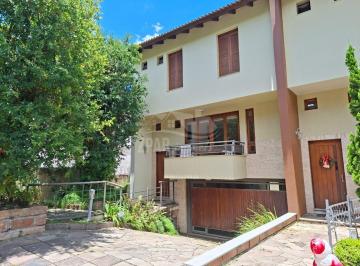 Foto 01 · Sobrado de alto padrão em condomínio no Jardim Isabel, Porto Alegre - 279m², 3 dormitórios sendo 1 s
