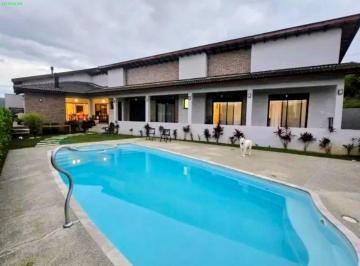 Foto 01 · Condomínio Flamboyant Casa Térrea e Nova com 4 Suites, Piscina e 4 vagas, em Bragança Paulista