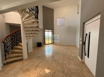 Sala se estar pé direito duplo · Cobertura Duplex 360 m² no Edifício Portal América, Centro de Araras