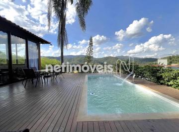 piscina ligada a sala e área goumert · Casa de condomínio em Nova Lima