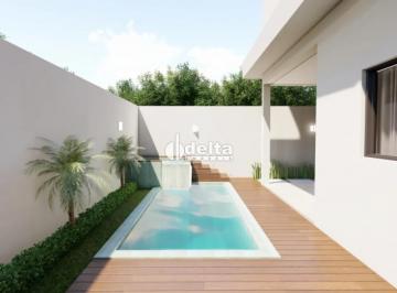 Casa · 281m² · 3 Quartos · 2 Vagas · Casa em condomínio com 3 suítes disponível para venda no bairro Novo Mundo em Uberlândia-MG
