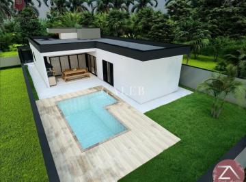 Foto 01 · Casa com piscina, térrea e em loteamento com portaria