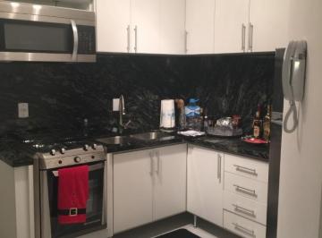 Foto 01 · Apartamento com 2 dormitórios no Centro com 1 vaga de garagem