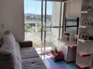 389432898380150 · Apartamento dois dormitórios, semi mobiliado com sacada e churrasqueira