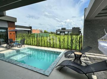 Casa · 175m² · 4 Quartos · 2 Vagas · Casa em Condomínio com 4 suítes mobliada e com piscina em Capão da Canoa