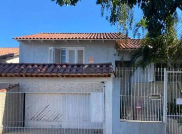 Casa · 125m² · 3 Quartos · 2 Vagas · Casa com Duas Residências e Pátio Amplo no Bairro Tranquilo