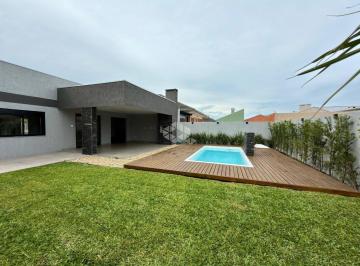 Casa · 112m² · 3 Quartos · 6 Vagas · Casa em Atlântida Sul, 03 dormitórios, 01 suíte várias vagas