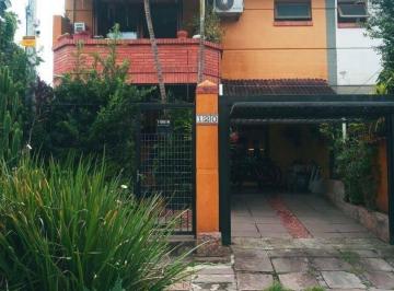 7aa69543904f91b9b15524d6366c18ebf9e14030 · Casa com 4 dormitórios para alugar, 154 m² por R$ 7.150,00/mês - Guarujá - Porto Alegre/RS