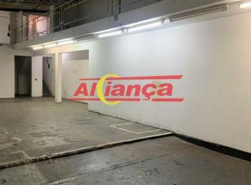 Comercial · 120m² · Salão comercial no centro, com 2 banheiros, portas de aço, entrada laterall