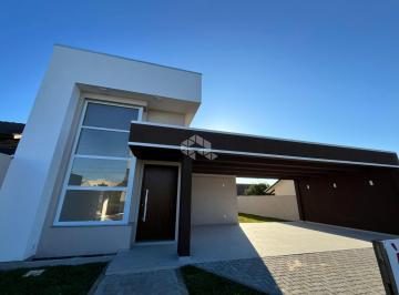 Casa · 153m² · 3 Quartos · 3 Vagas · Casa em Mariluz, Imbé com 3 dormitórios sendo 1 suíte, lareira, churrasqueira e pergolado