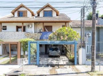 Casa · 185m² · 3 Quartos · 2 Vagas · Casa com 3 dormitórios no bairro Espírito Santo em Porto Alegre