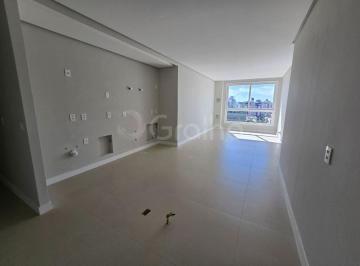 2 · Apartamento de 73m² com 2 quartos sendo 1 suíte no Centro