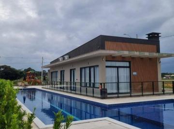 c0fa70bf561cc74b5b725cac4ffe658b0b2f752c · Terreno em Condominio Skayline à venda, 200 m² - Barra do Itapocú - Araquari/SC