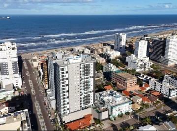 Apartamento · 69m² · 2 Quartos · 1 Vaga · Apartamento com 2 Dormitórios (1 Suíte), vaga de garagem coberta à Venda em Tramandaí – Infraestrutu