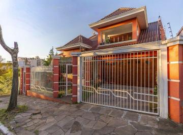 Casa · 297m² · 4 Quartos · 3 Vagas · Casa de 3 quartos, 1 suíte e 3 vagas de garagem em Canoas