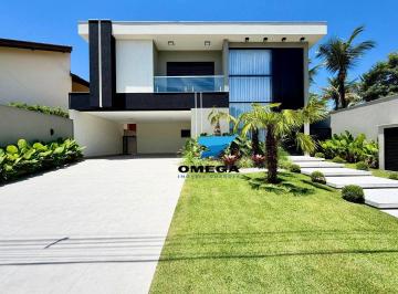 53d66623c0dedf9ad3a95e30644e398002075abd · Casa à venda no Condomínio Jardim Acapulco em Guaujá | Omega Imóveis