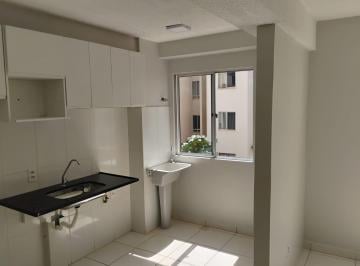 Cozinha com pia em granito e armários · Apartamento Avenida Monumental, Setor Total Ville, Quadra 206