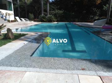 Casa · 619m² · 6 Quartos · Oportunidade Única! Viva o Luxo e a Exclusividade no Condomínio Estância das Amendoeiras!