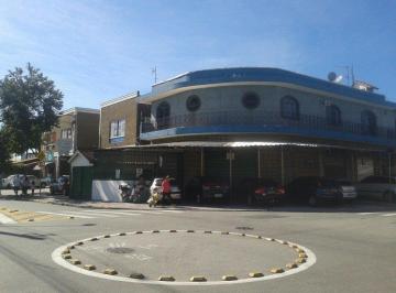 539_iv5w6y7W5sHZ30T34Tw5_539577e5eae74974.jpg · Prédio comercial na principal rua do bairro