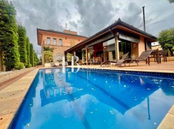 Foto 01 · Imponente Sobrado Estilo Mediterrâneo com 4 Quartos e 349m² de Área Construída no Condomínio Reserva