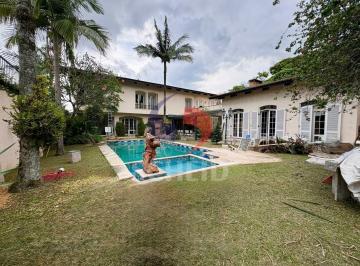 Casa · 896m² · 5 Quartos · 10 Vagas · Casa à venda no Jardim Cordeiro com 5 suítes, piscina, churrasqueira e 10 vagas de garagem.