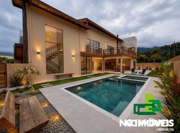 Casa · 420m² · 4 Quartos · 3 Vagas · Casa com Arquitetura Contemporânea Tropical à Venda | Condomínio Mar Verde