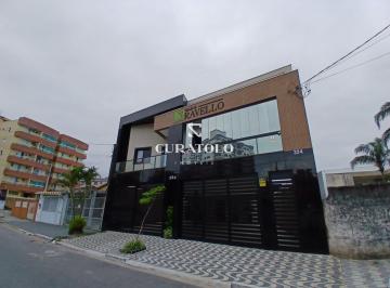 Casa · 71m² · 2 Quartos · 1 Vaga · Casa em condomínio à venda na Praia Grande com 71 m², 2 suítes e varanda.