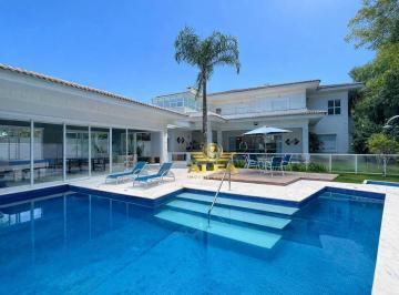 fa0aba7abf194064b406eed08bd7a9a2a50af05b · Casa de Alto Padrão à Venda no Condomínio Jardim Pernambuco I – Alfa Imóveis Guarujá