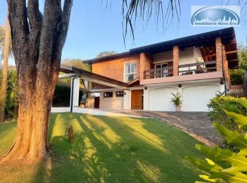 ea0192cb1b586e32cd8b7c02f020fc6685e17fed · Casa com 3 dormitórios à venda, 232 m² por R$ 1.650.000,00 - Condomínio Marambaia - Vinhedo/SP