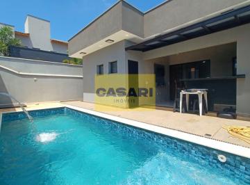 Photo 1 · Casa térrea com 3 dormitórios, sendo 1 suíte, estilo moderna com pé direito alto