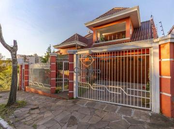 Casa · 297m² · 4 Quartos · 3 Vagas · Casa de 3 quartos, 1 suíte e 3 vagas de garagem em Canoas