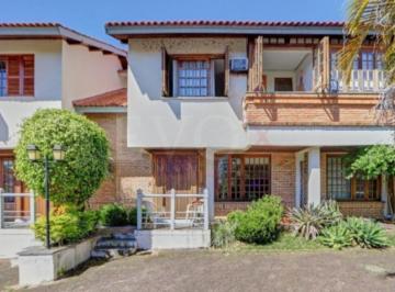 Foto 01 · Casa em Condomínio - 135m², 3 dormitórios, 1 suíte, 2 vagas, no bairro Cavalhada/Ipanema