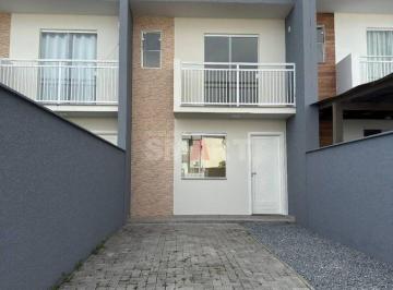 Casa · 2 Quartos · 2 Vagas · Geminado semimobiliado com 2 quartos, um deles com sacada
